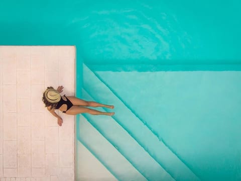 Seasonal outdoor pool, open 9:00 AM to 7:30 PM, sun loungers