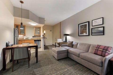 Suite, 1 Bedroom | Living area | TV