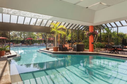 Indoor pool, outdoor pool, open 6:00 AM to 6:30 PM, pool umbrellas