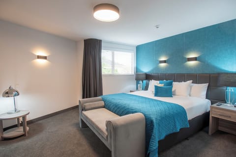 Luxury Suite, 1 Bedroom | Pillowtop beds, in-room safe, desk, iron/ironing board