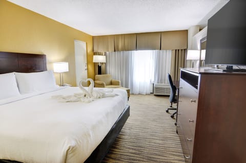 Suite, 1 King Bed | Desk, blackout drapes, iron/ironing board, cribs/infant beds