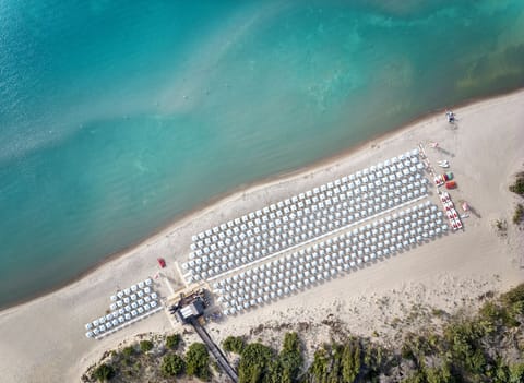 Private beach, free beach shuttle, sun loungers, beach umbrellas