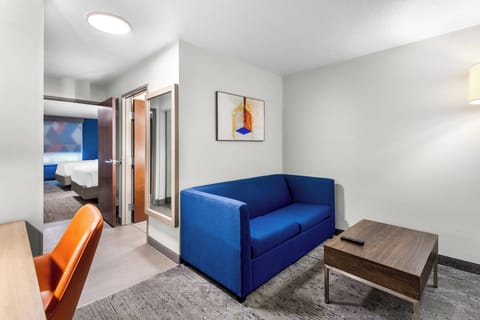 Suite, 2 Queen Beds | Desk, iron/ironing board, free cribs/infant beds, rollaway beds