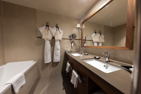 Suite, 1 Double Bed, River View | Bathroom | Designer toiletries, hair dryer, bathrobes, slippers