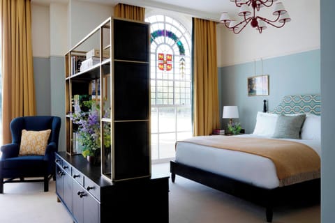 Suite, 1 King Bed, Park View | Premium bedding, in-room safe, blackout drapes, iron/ironing board