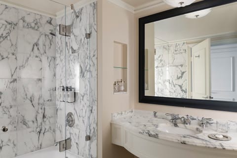 Combined shower/tub, designer toiletries, hair dryer, bathrobes