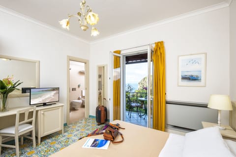 Comfort Double Room, Balcony, Sea View | Minibar, in-room safe, desk, free WiFi