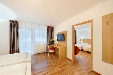 Quadruple Room | Hypo-allergenic bedding, in-room safe, desk, free WiFi