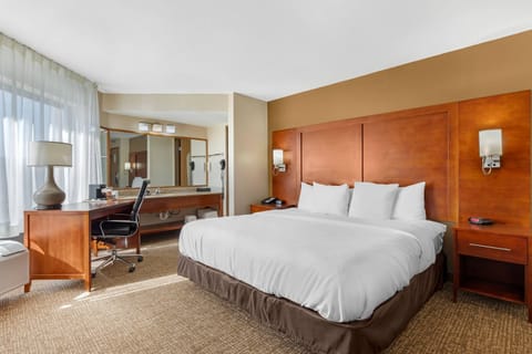 Desk, blackout drapes, iron/ironing board, free cribs/infant beds