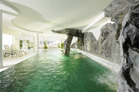 Indoor pool, seasonal outdoor pool, pool umbrellas, sun loungers