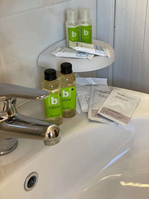 Shower, free toiletries, hair dryer, slippers