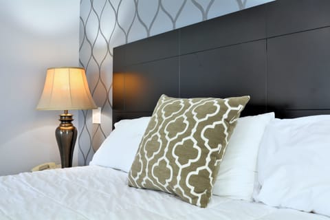 Down comforters, blackout drapes, iron/ironing board (on request)