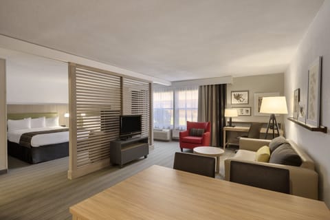 Suite, 2 Queen Beds | Desk, iron/ironing board, free cribs/infant beds, free WiFi