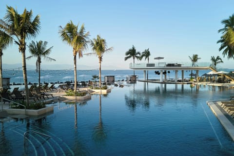 Indoor pool, outdoor pool, pool umbrellas