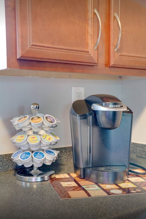 Keurig coffee maker with free coffee, tea, and hot chocolate.