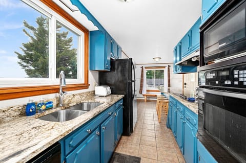 Kitchen with granite countertops & Lake View