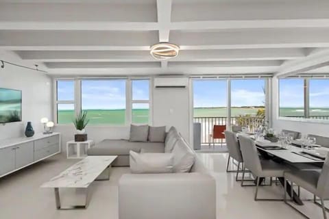 Apartment, 3 Bedrooms | Living area | Flat-screen TV
