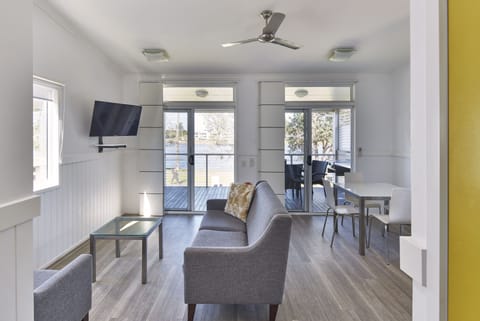 Lakeview Villa | Living area | 50-inch flat-screen TV with satellite channels, TV