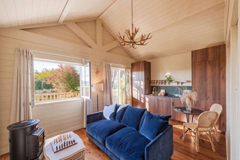 Cottage, Lake View | Living area | Flat-screen TV, pay movies