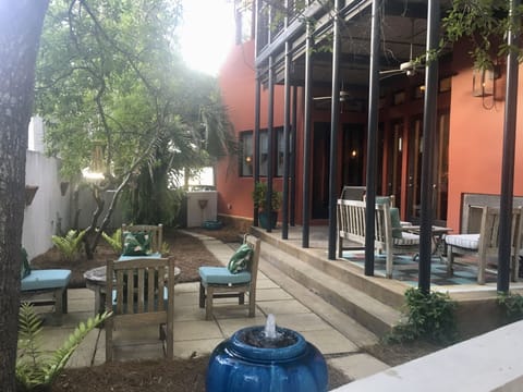New Orleans style courtyard, patio, fountain & fireplace.