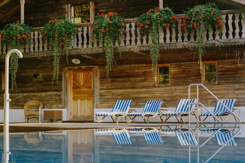 Outdoor pool, open 9:00 AM to 8 PM, sun loungers