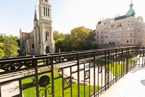 Huge balcony overlooking beautiful church square