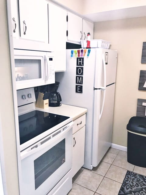 Brand new fridge, microwave and oven.  Regular coffee pot