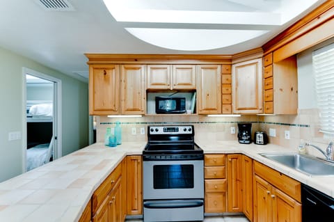 Anna Cabana A kitchen view from front door entry