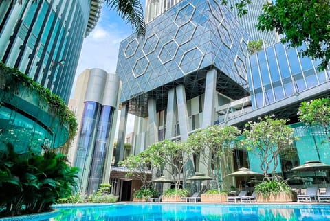 Outdoor pool, pool umbrellas, sun loungers