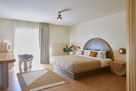Premium Room, 1 King Bed, Patio (Pet Friendly) | Desk, iron/ironing board, WiFi (free), alarm clocks