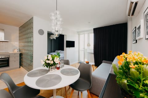 Comfort Apartment, 1 Bedroom, Balcony | Living area | Flat-screen TV