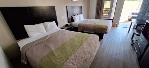 Premium bedding, desk, blackout drapes, iron/ironing board