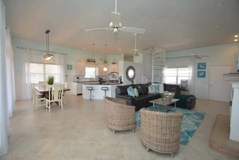 Beach-inspired open layout — relax, cook, and enjoy together