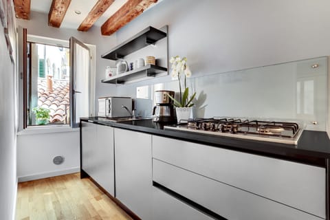 Apartment, 2 Bedrooms | Private kitchen | Full-size fridge, microwave, stovetop, dishwasher