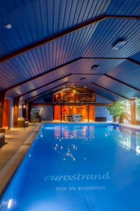 Indoor pool, sun loungers