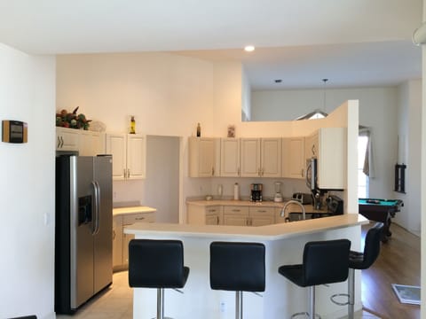 Full view of Kitchen, all appliances are stainless steel.