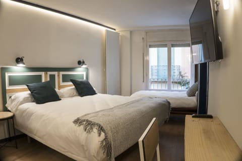 Family Triple Room | Premium bedding, down comforters, memory foam beds, desk