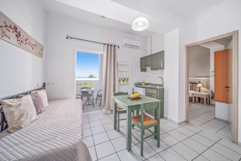 One Bedroom Triple Apartment | Living area | 24-inch flat-screen TV with satellite channels, TV