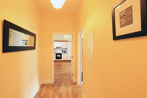 Deluxe Apartment, 2 Bedrooms | Living area | Flat-screen TV