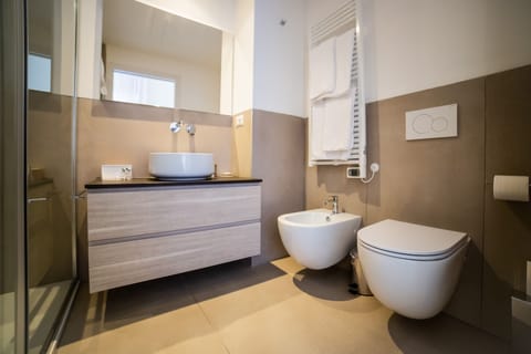 Shower, free toiletries, slippers, bidet