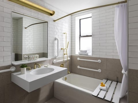 Designer toiletries, hair dryer, bathrobes, slippers