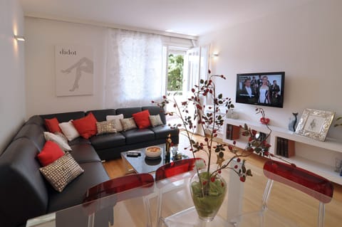 ...relax after a beach day in spacious and comfortable living room with terrace 