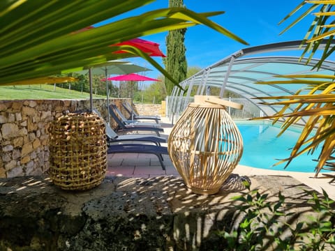 Outdoor pool, open 10:00 AM to 7:00 PM, pool umbrellas, sun loungers