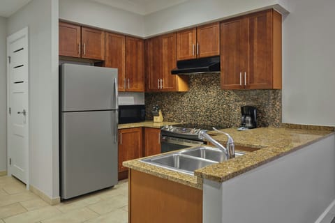 Full-size fridge, microwave, stovetop, dishwasher