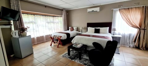 Deluxe Double Room, Garden View | 1 bedroom, premium bedding, minibar, iron/ironing board