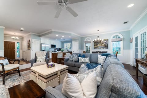 Hardwood floors, wainscot, built in bookshelves and a large HDTV  are just some of the  features throughout.