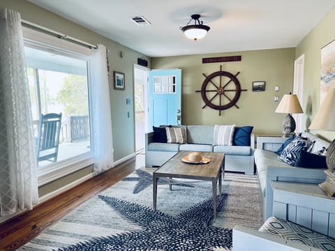 Living room: Large Flat Screen TV with YouTube TV and AMZ Prime Video. 