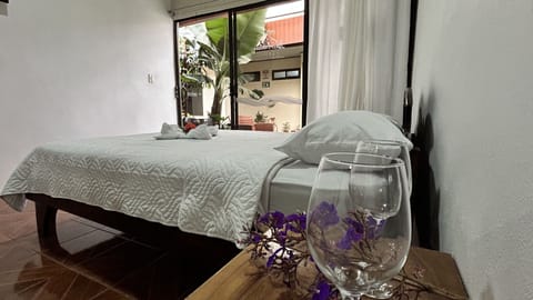 Family Room, 1 Bedroom | 1 bedroom, down comforters, minibar, iron/ironing board