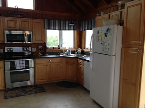 New stove and oven, kitchen window looks bayside