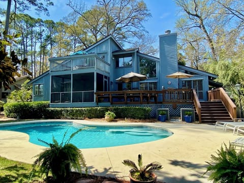 Backyard paradise with pool, spa, screened porch, deck, sun deck